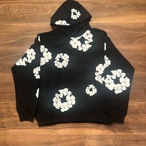 White on Black Denim Tears Hoodie.
